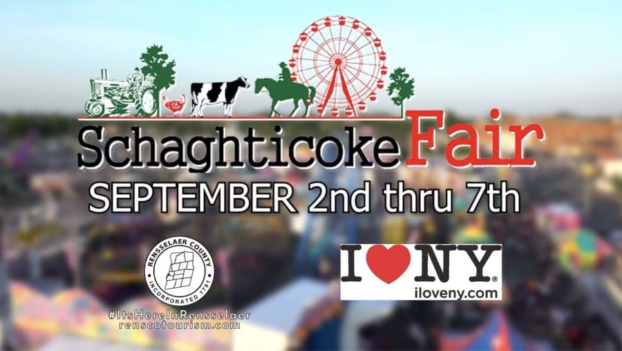 Promotional graphic for the Schaghticoke Fair, September 2nd through 7th, with the fair's tractor, cow, horse and Ferris wheel logo over an aerial view of the midway, plus the Rensselaer County seal and the I Love NY logo.